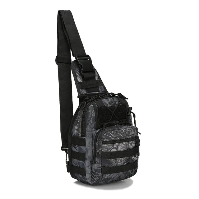 Angled side view of the Python Black tactical EDC sling pack showing MOLLE webbing, zippered compartments, and adjustable shoulder strap.
