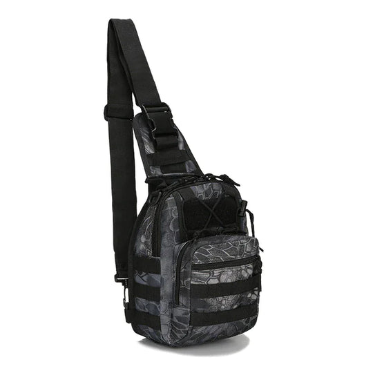 Angled side view of the Python Black tactical EDC sling pack showing MOLLE webbing, zippered compartments, and adjustable shoulder strap.